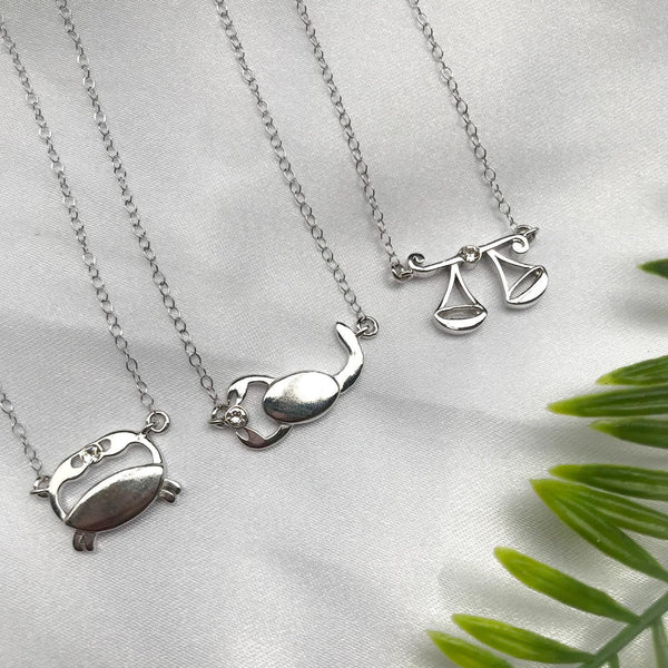 Libra constellation necklace sterling silver 925 Swarovski crystals – flatlay | LoveYours Collection