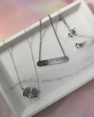 Gemini constellation necklace sterling silver 925 Swarovski crystals – flatlay | LoveYours Collection