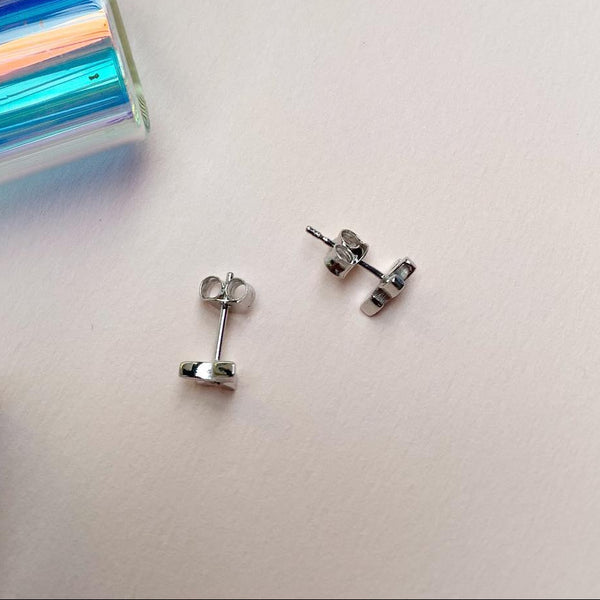 Sagittarius zodiac earrings sterling silver 925 Swarovski crystals – flatlay | LoveYours Collection