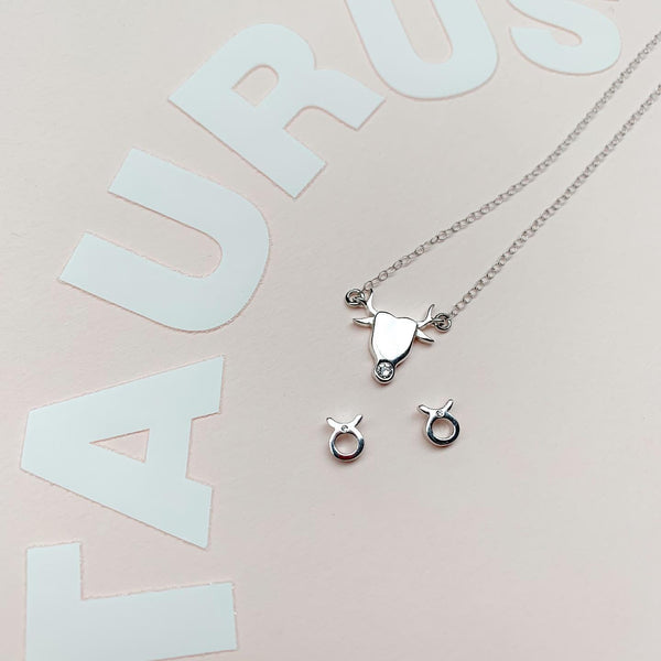 Taurus zodiac earrings sterling silver 925 Swarovski crystals – flatlay | LoveYours Collection